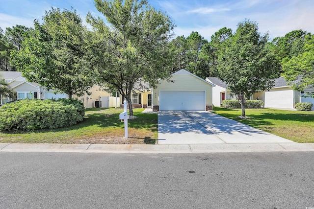 428 Bellegrove Dr, Myrtle Beach, SC 29577 - view of property hidden behind natural elements with a front yard, concrete driveway, and an attached garage
