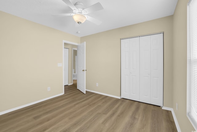428 Bellegrove Dr, Myrtle Beach, SC 29577 - unfurnished bedroom featuring wood finished floors, a closet, and ceiling fan
