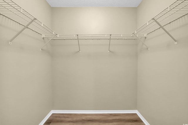 428 Bellegrove Dr, Myrtle Beach, SC 29577 - spacious closet featuring wood finished floors