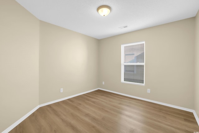 428 Bellegrove Dr, Myrtle Beach, SC 29577 - empty room featuring wood finished floors and baseboards