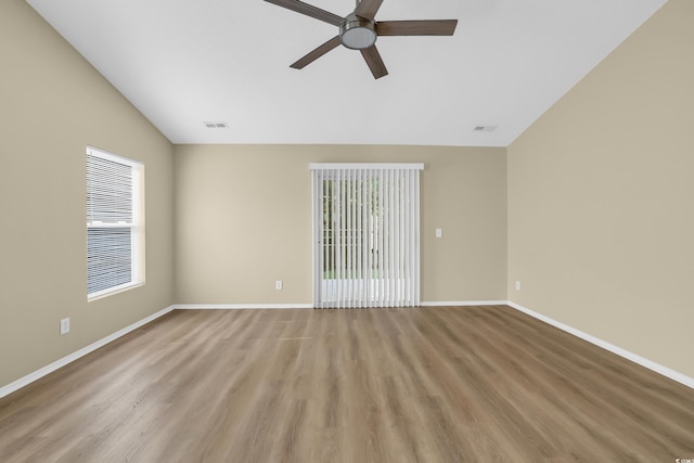 428 Bellegrove Dr, Myrtle Beach, SC 29577 - unfurnished room featuring lofted ceiling, a ceiling fan, and wood finished floors
