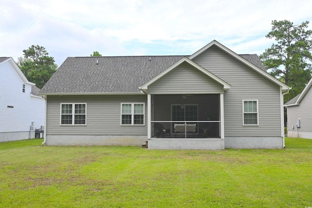 523 Charlton Blvd, Georgetown, SC 29440 - back of house featuring a yard, a sunroom, and a shingled roof