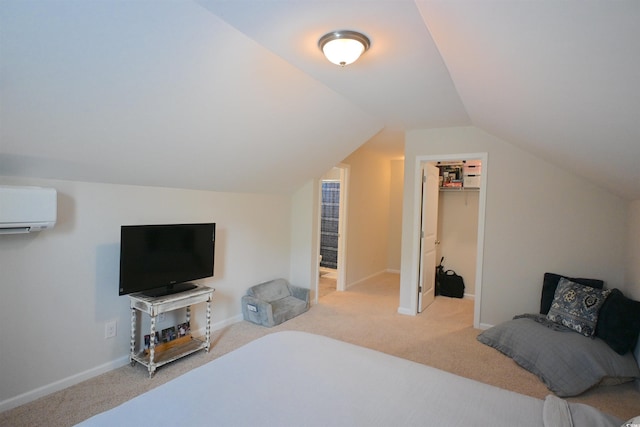 523 Charlton Blvd, Georgetown, SC 29440 - carpeted bedroom with an AC wall unit, vaulted ceiling, a spacious closet, and a closet