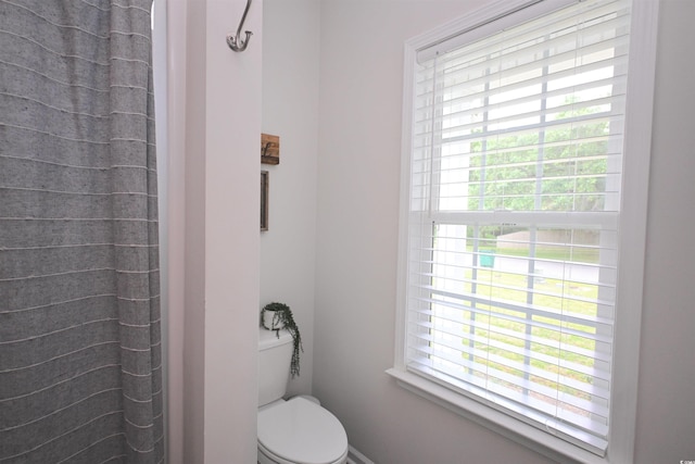523 Charlton Blvd, Georgetown, SC 29440 - bathroom with toilet and curtained shower