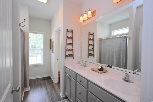 523 Charlton Blvd, Georgetown, SC 29440 - full bathroom with double vanity, wood finished floors, and curtained shower