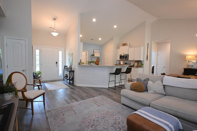 523 Charlton Blvd, Georgetown, SC 29440 - living area with high vaulted ceiling, dark wood finished floors, and recessed lighting