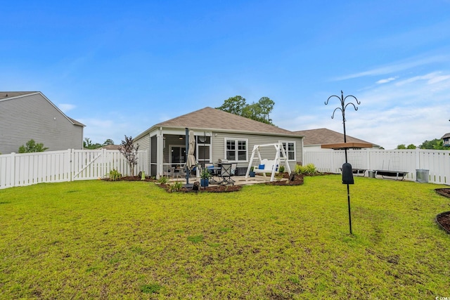 208 Forestbrook Cove Cir, Myrtle Beach, SC 29588 - rear view of house with a fenced backyard, a patio, a gate, a shingled roof, and a sunroom