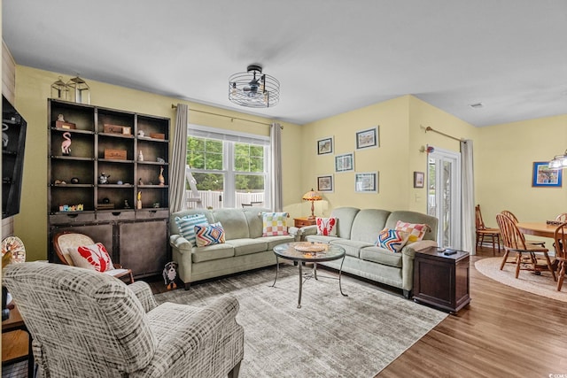 208 Forestbrook Cove Cir, Myrtle Beach, SC 29588 - living room with wood finished floors and a chandelier
