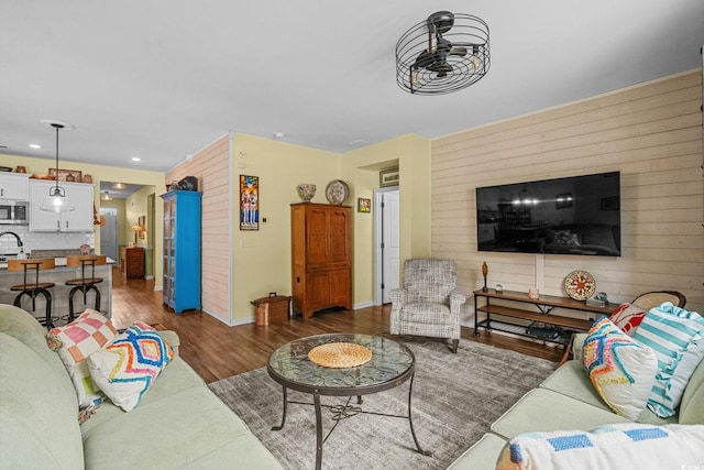 208 Forestbrook Cove Cir, Myrtle Beach, SC 29588 - living area with dark wood-type flooring and wooden walls