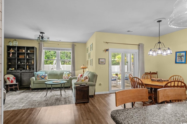 208 Forestbrook Cove Cir, Myrtle Beach, SC 29588 - dining space with a chandelier, dark wood-style flooring, and plenty of natural light