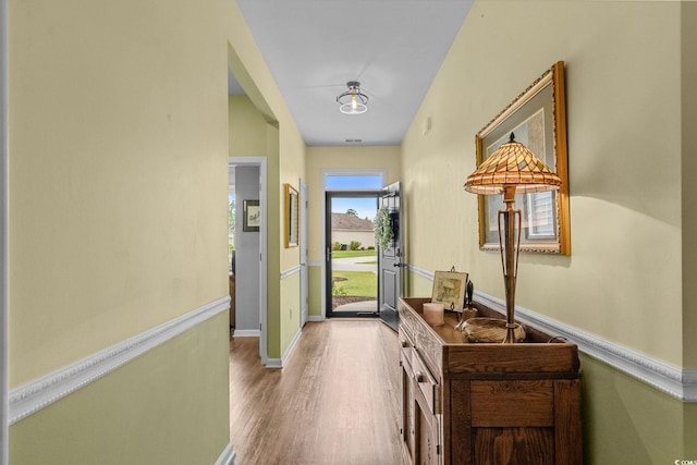 208 Forestbrook Cove Cir, Myrtle Beach, SC 29588 - doorway to outside featuring wood finished floors and baseboards