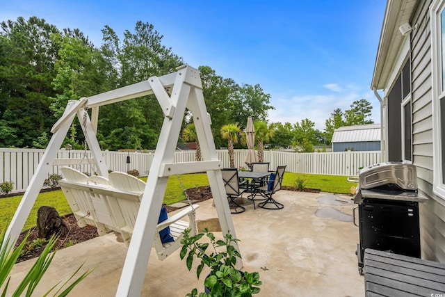 208 Forestbrook Cove Cir, Myrtle Beach, SC 29588 - fenced backyard featuring outdoor dining area, a patio area, and area for grilling