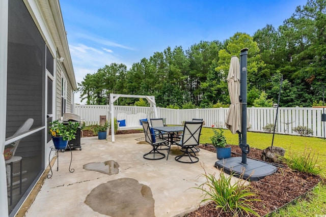 208 Forestbrook Cove Cir, Myrtle Beach, SC 29588 - fenced backyard featuring a patio and outdoor dining space