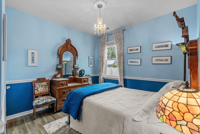 208 Forestbrook Cove Cir, Myrtle Beach, SC 29588 - bedroom with a chandelier and wood finished floors