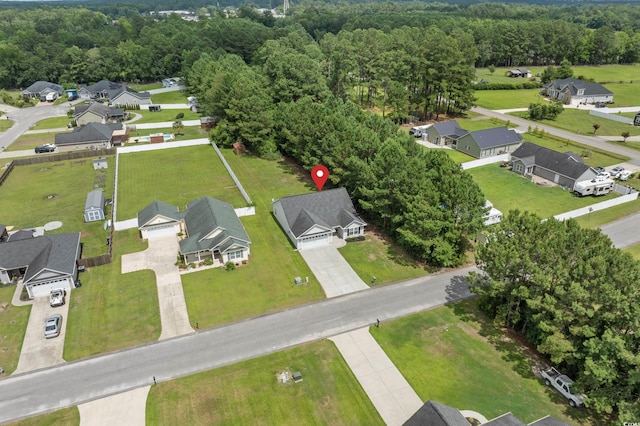 104 Fox Trot Dr, Galivants Ferry, SC 29544 - aerial overview of property's location with nearby suburban area and a heavily wooded area