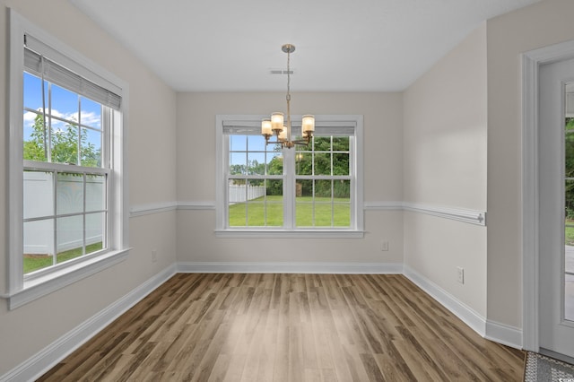 104 Fox Trot Dr, Galivants Ferry, SC 29544 - unfurnished dining area featuring plenty of natural light and wood finished floors