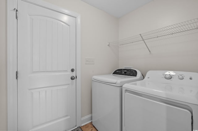 104 Fox Trot Dr, Galivants Ferry, SC 29544 - washroom with washing machine and dryer and baseboards