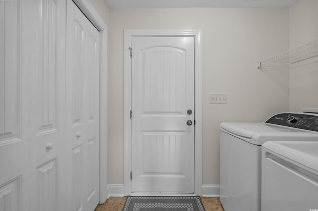 104 Fox Trot Dr, Galivants Ferry, SC 29544 - washroom featuring washer and clothes dryer and light tile patterned floors