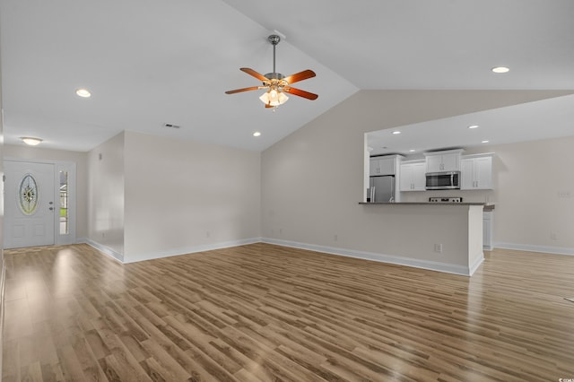 104 Fox Trot Dr, Galivants Ferry, SC 29544 - unfurnished living room featuring light wood-style floors, lofted ceiling, ceiling fan, and recessed lighting