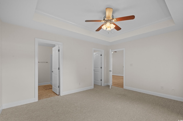 104 Fox Trot Dr, Galivants Ferry, SC 29544 - unfurnished bedroom with a tray ceiling, ornamental molding, light colored carpet, and a ceiling fan