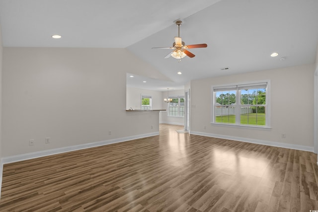 104 Fox Trot Dr, Galivants Ferry, SC 29544 - unfurnished living room featuring wood finished floors, a ceiling fan, lofted ceiling, a chandelier, and recessed lighting