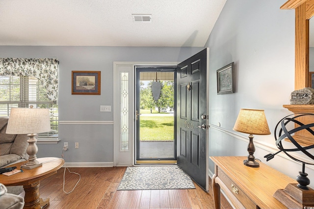 906 Hope Cir, Conway, SC 29527 - entrance foyer featuring light wood-type flooring and a textured ceiling