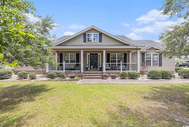 906 Hope Cir, Conway, SC 29527 - view of front of house with a front yard, covered porch, and roof with shingles