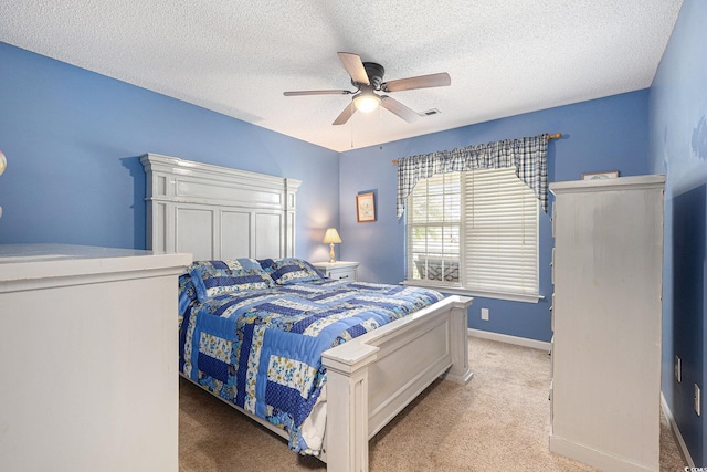 906 Hope Cir, Conway, SC 29527 - bedroom with light colored carpet, a textured ceiling, and a ceiling fan