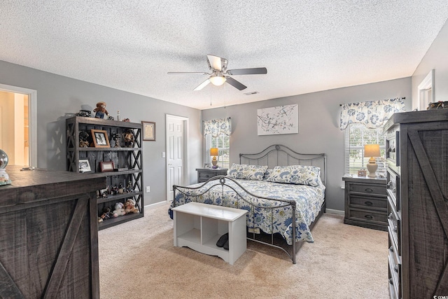 906 Hope Cir, Conway, SC 29527 - bedroom featuring light carpet, a textured ceiling, and a ceiling fan