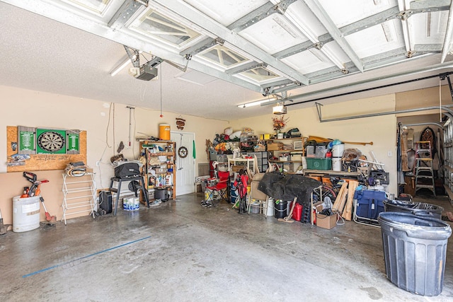 906 Hope Cir, Conway, SC 29527 - garage featuring a garage door opener and a workshop area