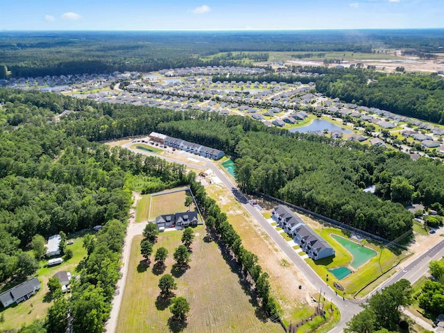 788 NW Palm Frond Way Unit 50, Calabash, NC 28467 - aerial view of a forest and a large body of water