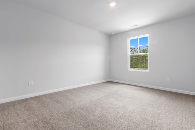 788 NW Palm Frond Way Unit 50, Calabash, NC 28467 - carpeted spare room with baseboards
