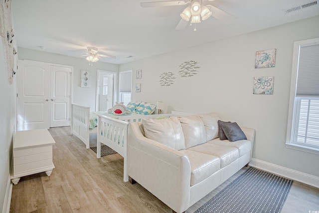 115A 8th Ave N, Surfside Beach, SC 29575 - living room with a ceiling fan and light wood finished floors