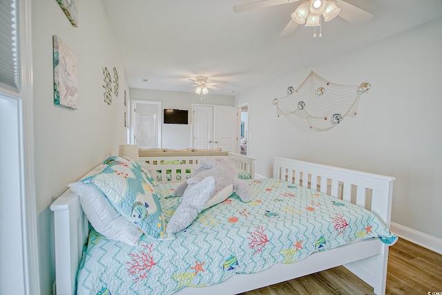 115A 8th Ave N, Surfside Beach, SC 29575 - bedroom featuring wood finished floors and a ceiling fan