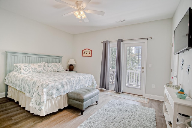 115A 8th Ave N, Surfside Beach, SC 29575 - bedroom featuring access to outside, wood finished floors, and a ceiling fan