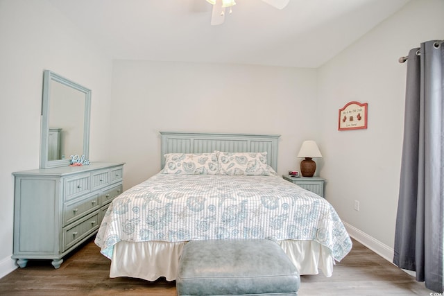 115A 8th Ave N, Surfside Beach, SC 29575 - bedroom with wood finished floors and a ceiling fan