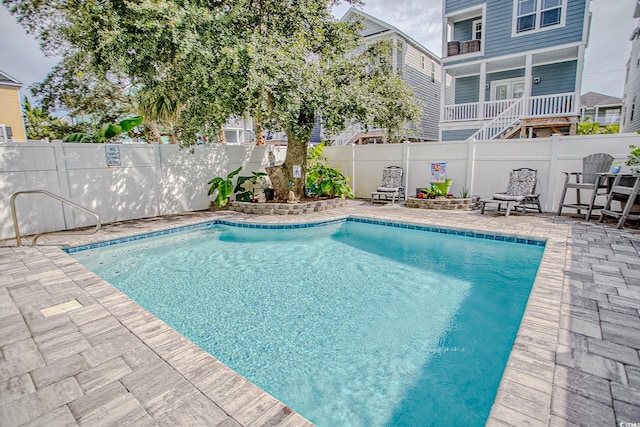 115A 8th Ave N, Surfside Beach, SC 29575 - view of swimming pool with a patio area and a fenced backyard
