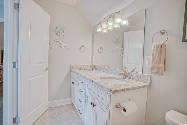 115A 8th Ave N, Surfside Beach, SC 29575 - full bath featuring double vanity, vaulted ceiling, and marble finish floors