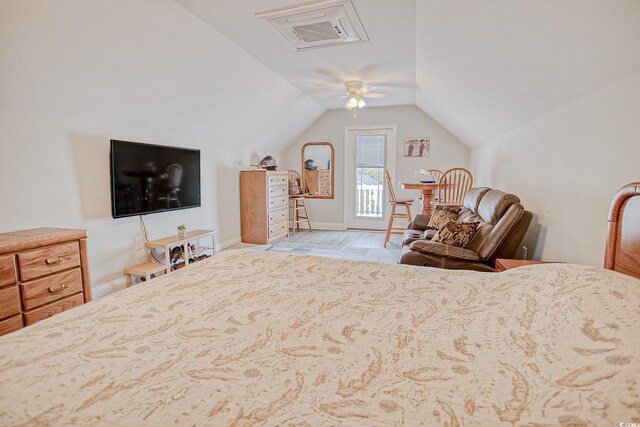 115A 8th Ave N, Surfside Beach, SC 29575 - bedroom with access to exterior, lofted ceiling, a ceiling fan, and light wood-style flooring