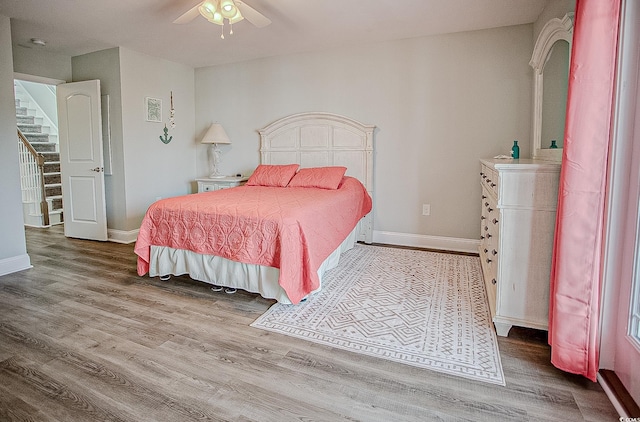 115A 8th Ave N, Surfside Beach, SC 29575 - bedroom with wood finished floors and a ceiling fan