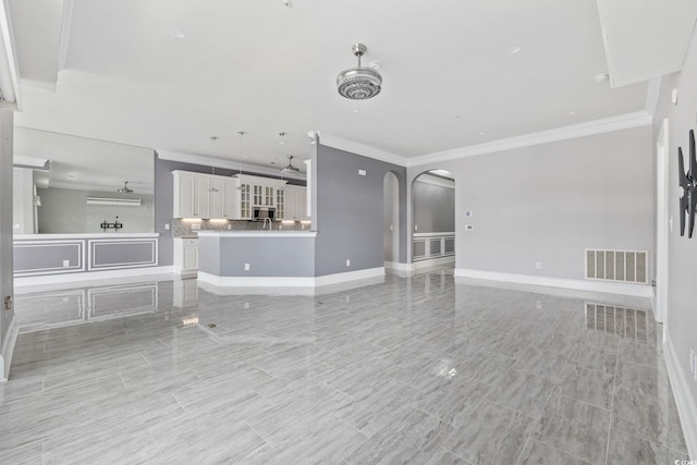 257 Venice Way Unit 2201, Myrtle Beach, SC 29577 - unfurnished living room with arched walkways and ornamental molding