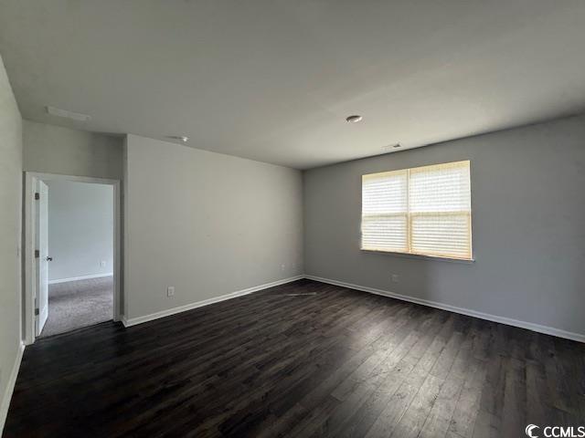 2061 Ridgedale Dr, Conway, SC 29526 - spare room with dark wood-style floors and baseboards