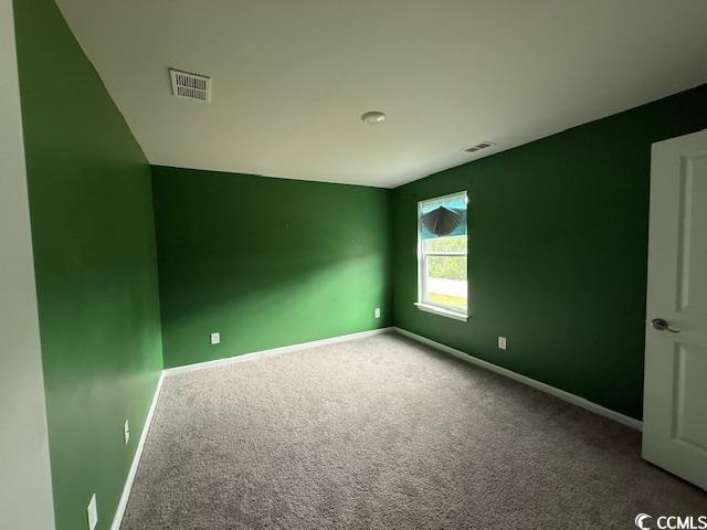2061 Ridgedale Dr, Conway, SC 29526 - spare room with baseboards and carpet floors