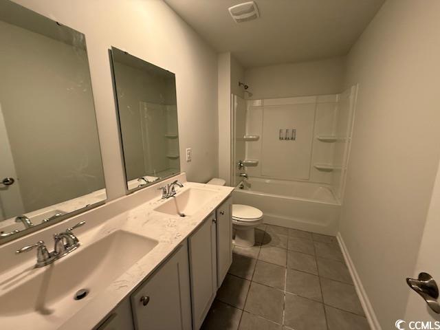 2061 Ridgedale Dr, Conway, SC 29526 - bathroom featuring tile patterned floors, double vanity, and bathing tub / shower combination