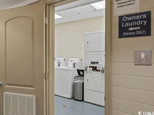 5523 N Ocean Blvd Unit 908, Myrtle Beach, SC 29577 - community laundry room with washer and clothes dryer