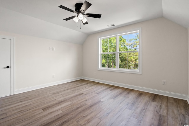 1712 26th Ave N, North Myrtle Beach, SC 29582 - additional living space with lofted ceiling, wood finished floors, and a ceiling fan