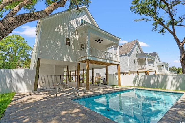 1712 26th Ave N, North Myrtle Beach, SC 29582 - rear view of property featuring ceiling fan, a patio area, and a balcony