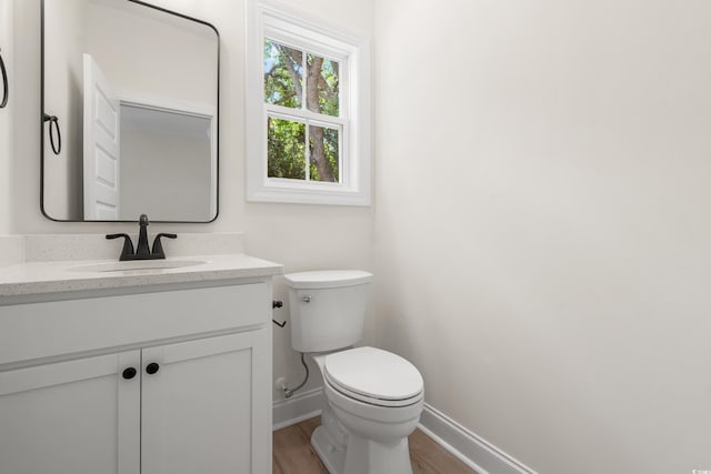 1712 26th Ave N, North Myrtle Beach, SC 29582 - bathroom featuring wood finished floors and vanity