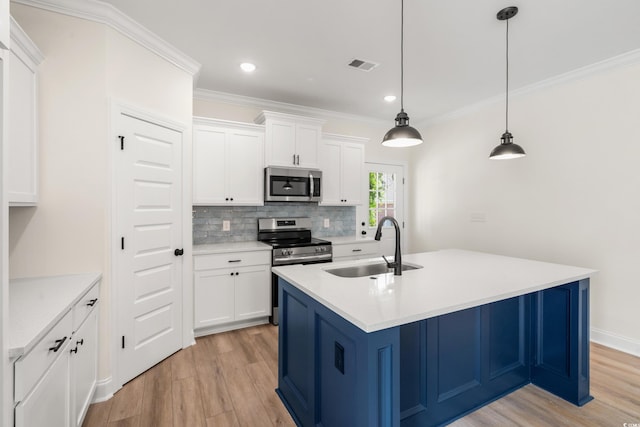 1712 26th Ave N, North Myrtle Beach, SC 29582 - kitchen with appliances with stainless steel finishes, light wood-type flooring, crown molding, backsplash, and light countertops