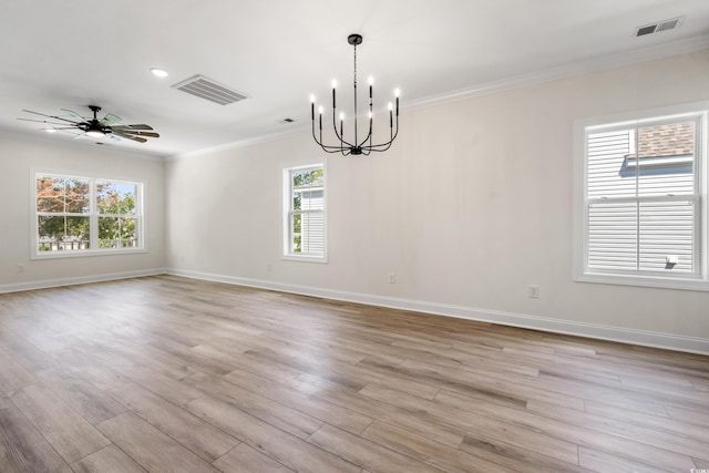 1712 26th Ave N, North Myrtle Beach, SC 29582 - spare room with ornamental molding, a chandelier, wood finished floors, and ceiling fan